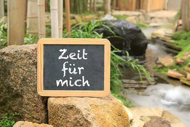 "Zeit für mich" geschriebene Worte auf einer Tafel